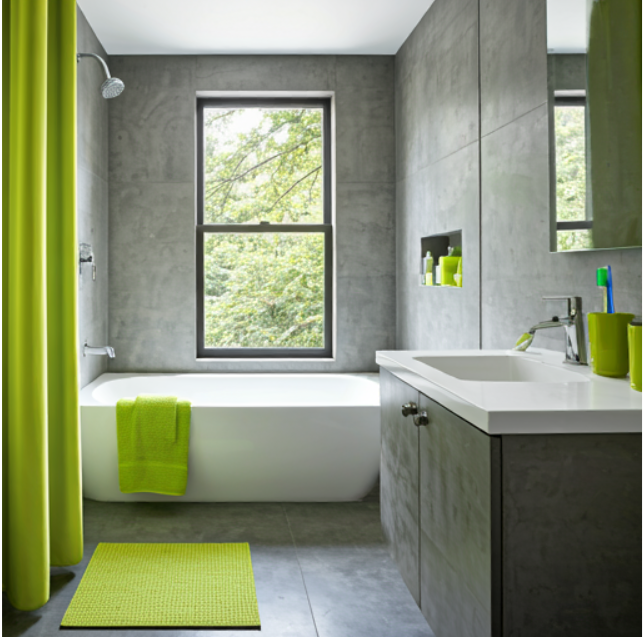 Chartreuse Green Accents In A Primarily Concrete Bathroom 